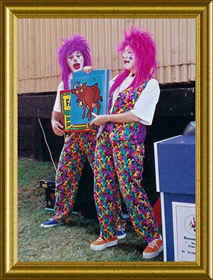 Razamatazz Clowns performing farmyard frolics at Didcot Steam Railway